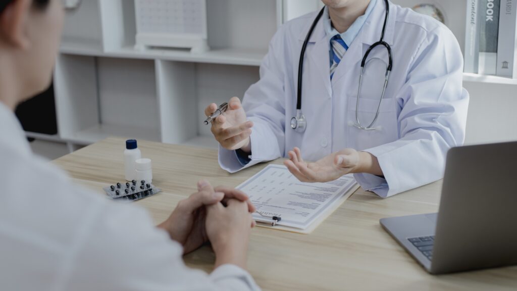 Doctor reviews surgical referral timeline